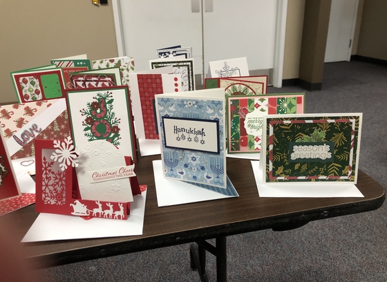 An array of handmade holiday cards included in each Project Holiday gift bag.